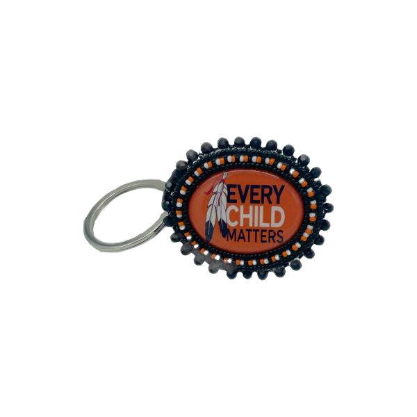 Emily Spencer: Keychain - Large Oval Every Child Matters Keychain